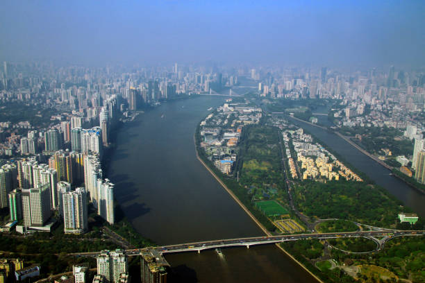 Canton Tower glowing above the Pearl River in Guangzhou
